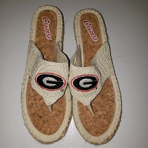 Cruzerz wedge UGA flip flops.